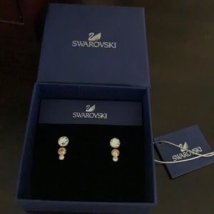 Swarovski Slake Dot pierced earrings in jacket style